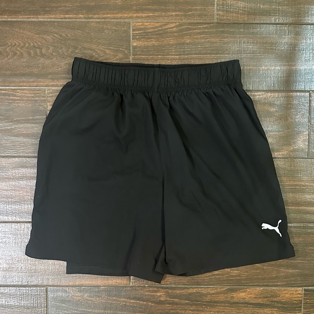 PUMA black Size L Men’s athletic shorts.